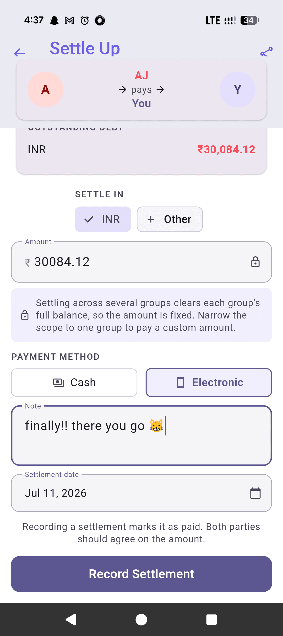Settle Up screen with a handwritten note attached to the payment